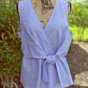 Sleeveless top with tie front